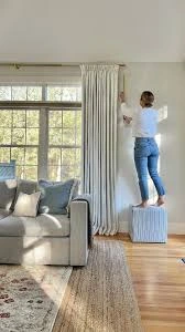 Hang Curtains to Add Height